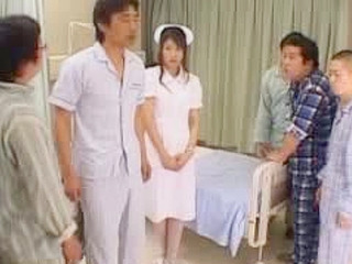 Naughty nurse enjoys a hot Asian gang bang