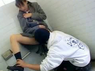 Hot Riku Shiina in a sexy Asian uniform sucks cock in a restroom