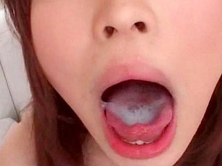 Sexy bimbo slurps down fresh jizz in Tokyo